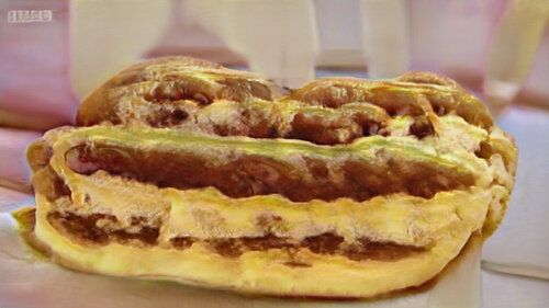 Is it a cake or some kind of excessively pocketed pita bread? Has several alternating patterns of void and dense cake. Is it a cake or some kind of excessively pocketed pita bread? Has several alternating patterns of void and dense cake.