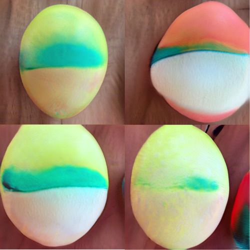 Four striped easter eggs - basically they have different-colored top and bottom halves. The colors don’t transition abruptly as you’d expect for a painted egg. Instead, there are haloes and bands of color, as you’d see in pretty much no easter egg ever.
