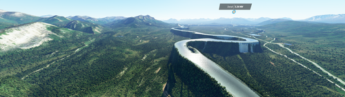 A panoramic view of a wide mountain landscape in Alaska’s Denali National Park. A river winds through the valley, on its own steep-sided platform elevated thousands of feet high. A panoramic view of a wide mountain landscape in Alaska’s Denali National Park. A river winds through the valley, on its own steep-sided platform elevated thousands of feet high.