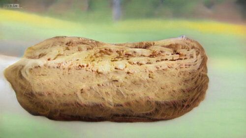 floating bread - color is a nice golden brown, but texture is doughy with periodic flecks and strange horiontal ridges. floating bread - color is a nice golden brown, but texture is doughy with periodic flecks and strange horiontal ridges.