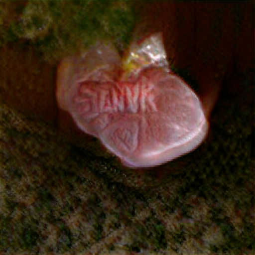 It looks like nothing more than a tightly cellophane wrapped human heart with the word Stannk standing out on it in veins.