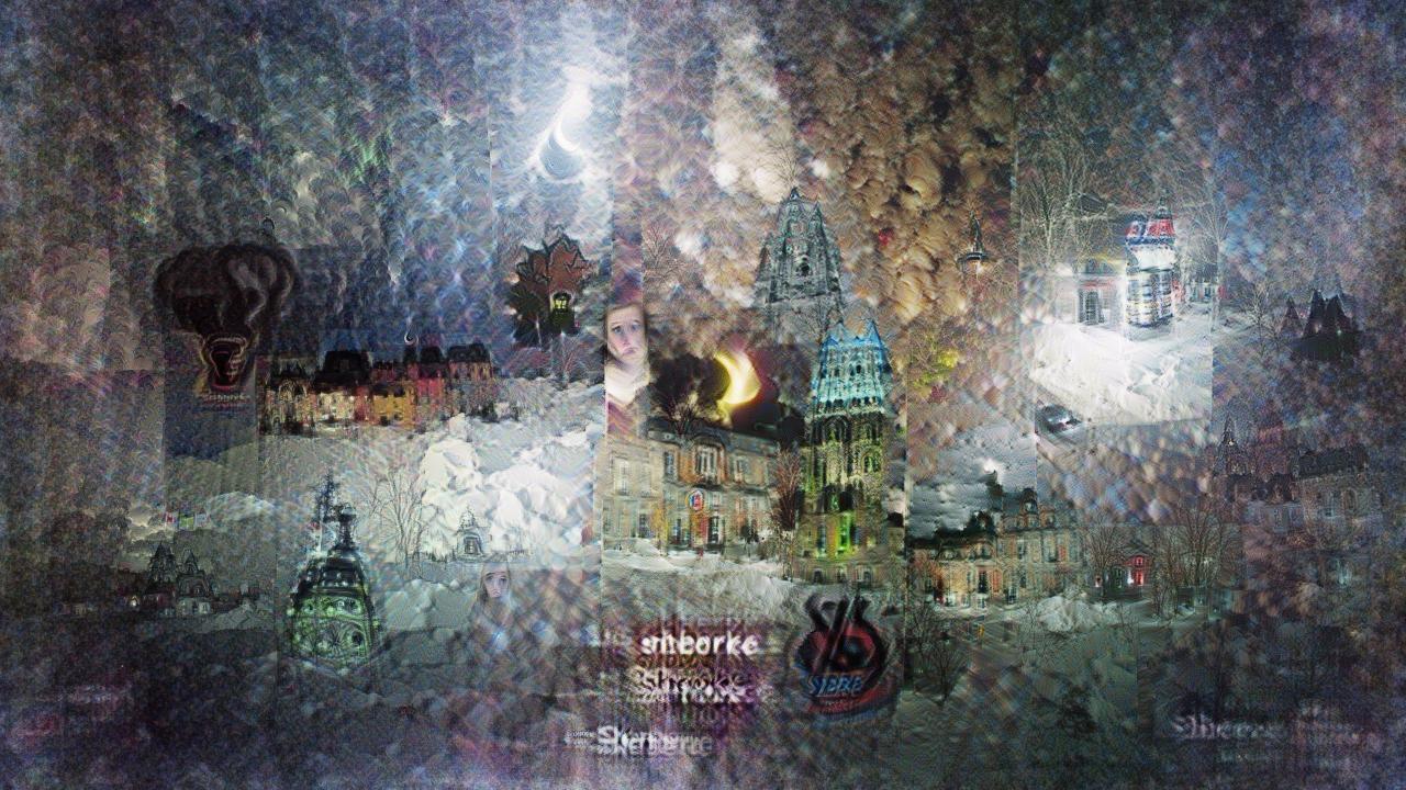 There are spires and yellow-walled streets, but now everything is shrouded in snow and darkness. A moon, or possibly an eclipsed sun, shines in the sky. There are spires and yellow-walled streets, but now everything is shrouded in snow and darkness. A moon, or possibly an eclipsed sun, shines in the sky.