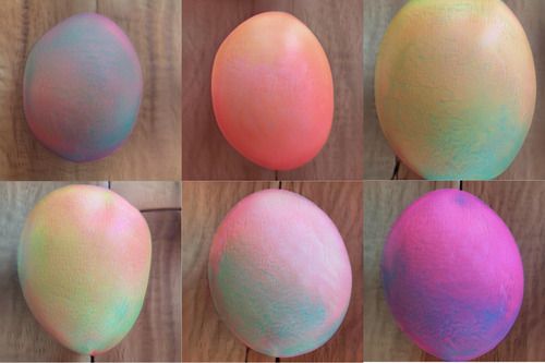 Eggs are variously egg-shaped, but strikingly pearlescent. One, for example, has maybe a deep blue undercoat with a scattering of green above, and a pink blush like an apple.