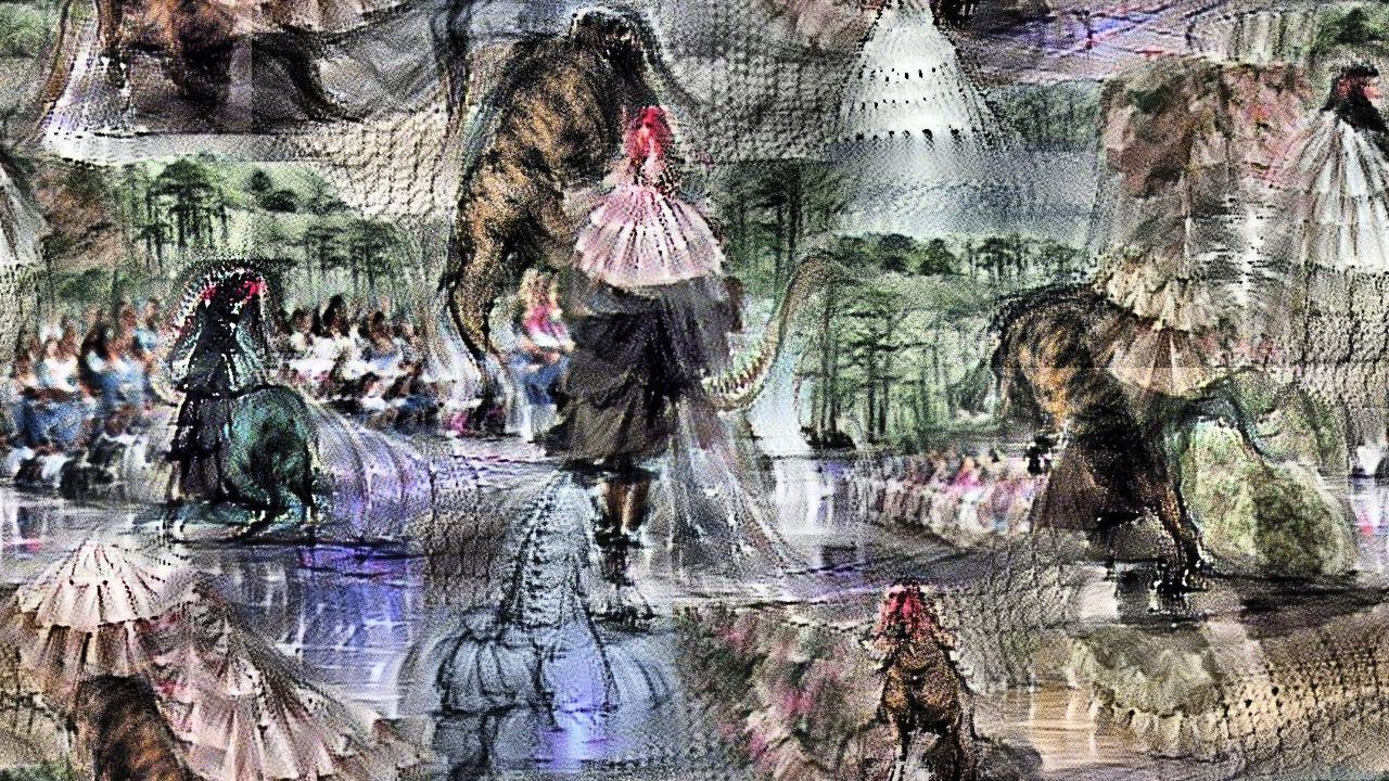 The tyrannosaurus isn't identifiably *in* the dress per se, but there are many tiered floofy white dresses, and strong hints of tyrannosaurus legs and tails, and nice Cretaceous trees in the background. Crowds line the runway. The tyrannosaurus isn't identifiably *in* the dress per se, but there are many tiered floofy white dresses, and strong hints of tyrannosaurus legs and tails, and nice Cretaceous trees in the background. Crowds line the runway.