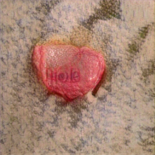 It's heartshaped in the sense that it has a butt-like cleft on top. A weird yellow stain exudes from the candy. It says "Hole" or maybe "Mole" It's heartshaped in the sense that it has a butt-like cleft on top. A weird yellow stain exudes from the candy. It says "Hole" or maybe "Mole"
